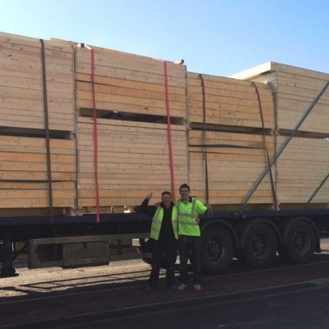 timber frames on the back of a lorry